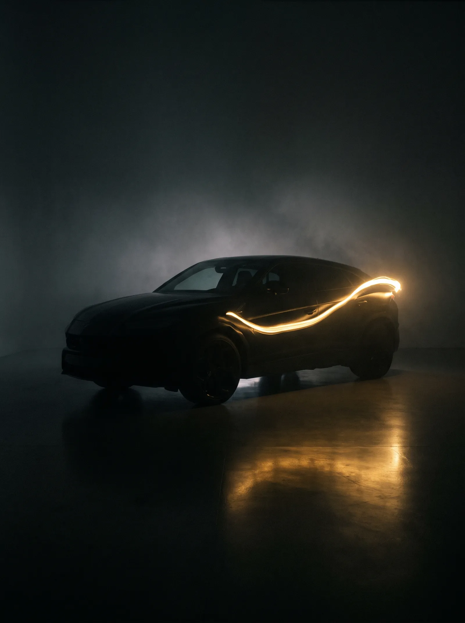 A dark SUV in haze with a single trail of golden light drawn along its side, reflected in a polished floor